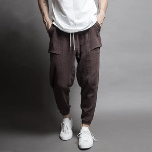 Sixtine Apparel | SOHO Modern Cargo Pants - brown. Model back view.