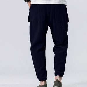 Sixtine Apparel | SOHO Modern Cargo Pants - navy blue. Model back view.