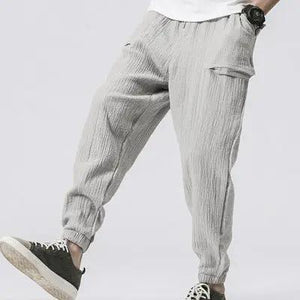 Sixtine Apparel | SOHO Modern Cargo Pants - grey. Model front view.