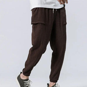 Sixtine Apparel | SOHO Modern Cargo Pants - brown. Model front view.