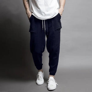 Sixtine Apparel | SOHO Modern Cargo Pants - black. Model front view.