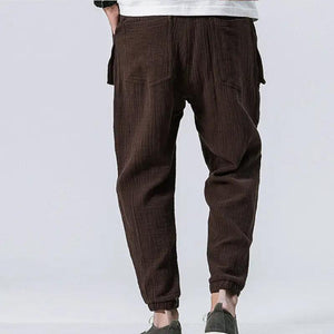 Sixtine Apparel | SOHO Modern Cargo Pants - brown. Model back view.